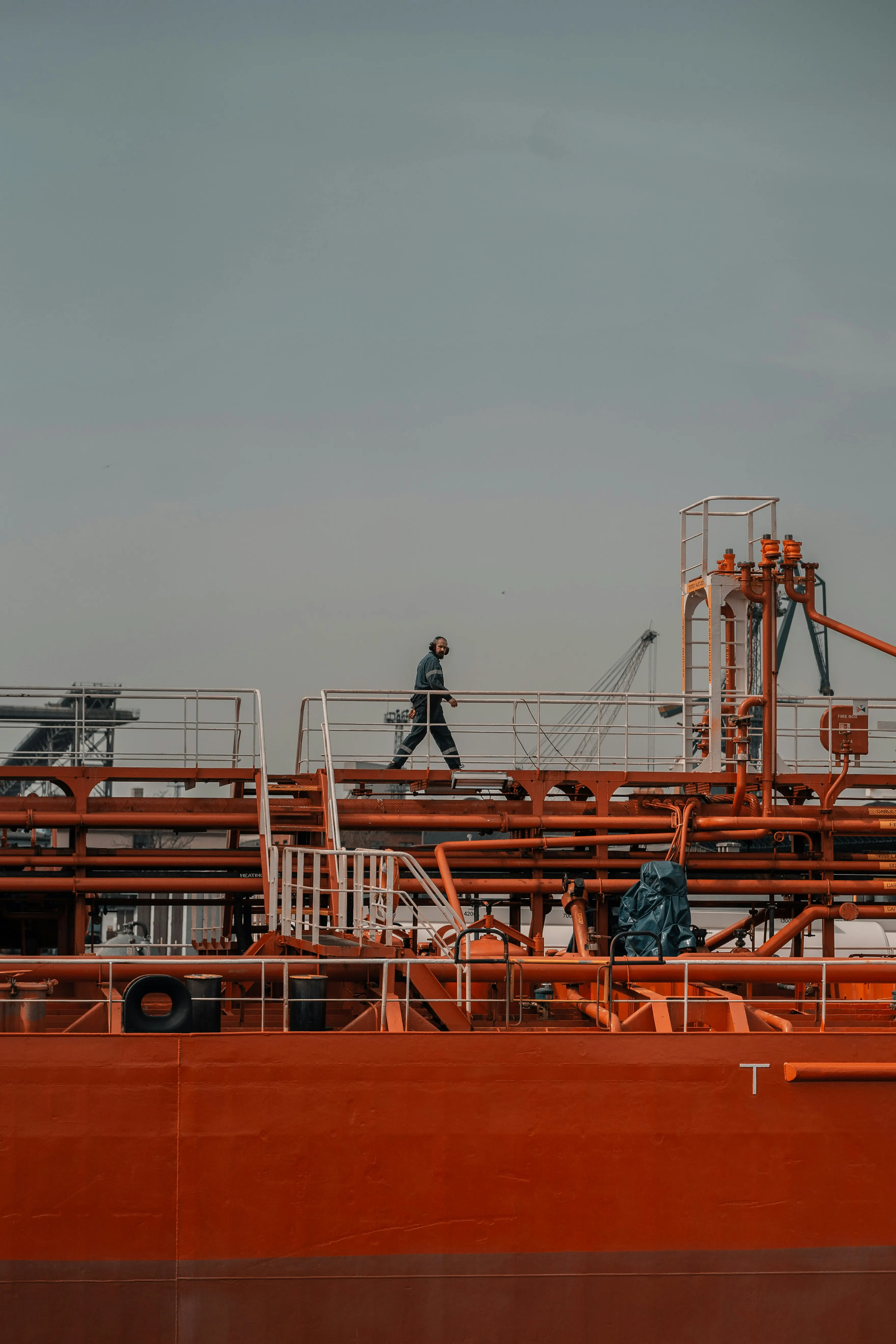 Worker on tanker ship deck